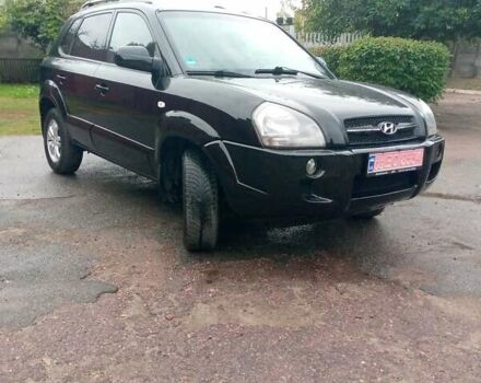 Чорний Хендай Туксон, об'ємом двигуна 2 л та пробігом 225 тис. км за 7850 $, фото 18 на Automoto.ua