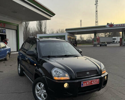 Черный Хендай Туксон, объемом двигателя 2 л и пробегом 210 тыс. км за 7850 $, фото 2 на Automoto.ua