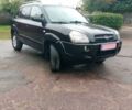 Чорний Хендай Туксон, об'ємом двигуна 2 л та пробігом 225 тис. км за 7850 $, фото 18 на Automoto.ua