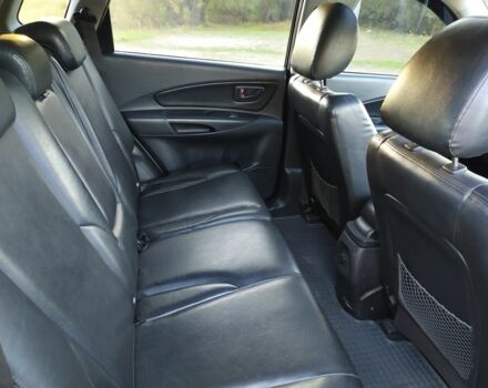 Черный Хендай Туксон, объемом двигателя 2 л и пробегом 162 тыс. км за 8500 $, фото 9 на Automoto.ua