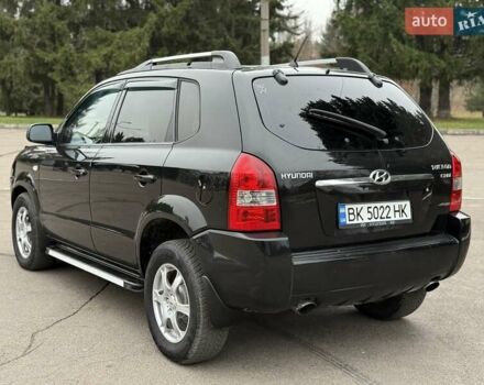Черный Хендай Туксон, объемом двигателя 1.99 л и пробегом 240 тыс. км за 7200 $, фото 25 на Automoto.ua