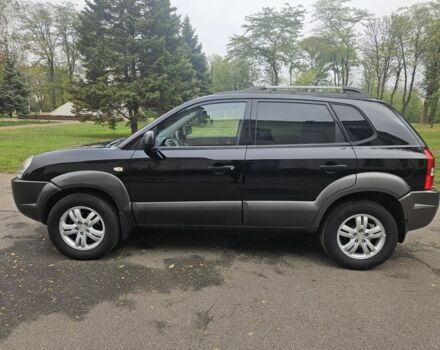 Чорний Хендай Туксон, об'ємом двигуна 2 л та пробігом 186 тис. км за 8300 $, фото 9 на Automoto.ua