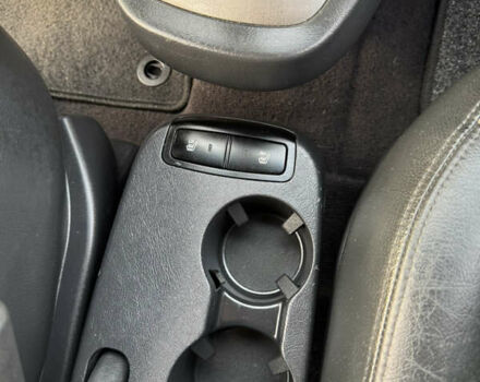 Черный Хендай Туксон, объемом двигателя 2 л и пробегом 210 тыс. км за 7850 $, фото 33 на Automoto.ua