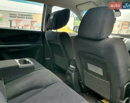 Чорний Хендай Туксон, об'ємом двигуна 2 л та пробігом 225 тис. км за 8000 $, фото 33 на Automoto.ua