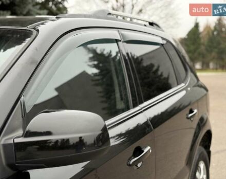 Черный Хендай Туксон, объемом двигателя 1.99 л и пробегом 240 тыс. км за 7200 $, фото 6 на Automoto.ua