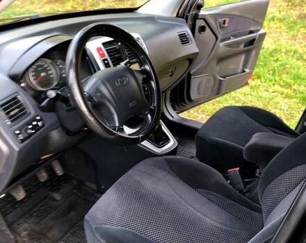 Черный Хендай Туксон, объемом двигателя 2 л и пробегом 220 тыс. км за 8000 $, фото 6 на Automoto.ua