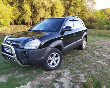 Черный Хендай Туксон, объемом двигателя 2 л и пробегом 162 тыс. км за 8500 $, фото 13 на Automoto.ua