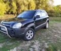 Черный Хендай Туксон, объемом двигателя 2 л и пробегом 162 тыс. км за 8500 $, фото 13 на Automoto.ua