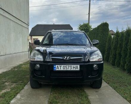 Черный Хендай Туксон, объемом двигателя 2 л и пробегом 255 тыс. км за 8300 $, фото 1 на Automoto.ua