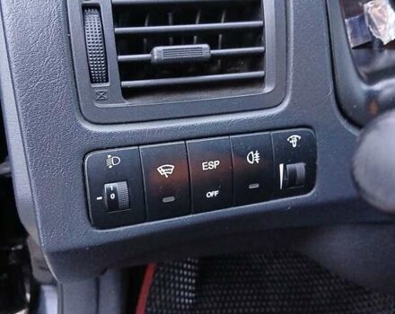 Черный Хендай Туксон, объемом двигателя 2 л и пробегом 230 тыс. км за 8000 $, фото 4 на Automoto.ua