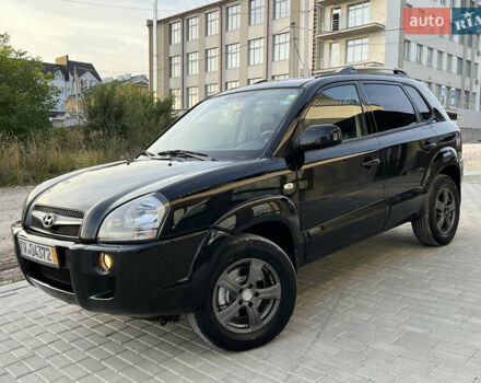 Чорний Хендай Туксон, об'ємом двигуна 1.98 л та пробігом 185 тис. км за 7199 $, фото 2 на Automoto.ua
