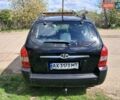 Черный Хендай Туксон, объемом двигателя 2 л и пробегом 270 тыс. км за 7500 $, фото 6 на Automoto.ua