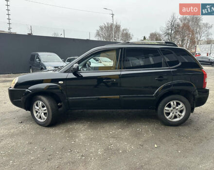 Чорний Хендай Туксон, об'ємом двигуна 2 л та пробігом 243 тис. км за 7999 $, фото 10 на Automoto.ua