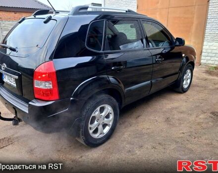 Чорний Хендай Туксон, об'ємом двигуна 2 л та пробігом 208 тис. км за 7500 $, фото 11 на Automoto.ua
