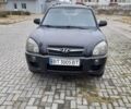 Черный Хендай Туксон, объемом двигателя 2 л и пробегом 191 тыс. км за 6800 $, фото 1 на Automoto.ua