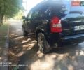 Чорний Хендай Туксон, об'ємом двигуна 1.98 л та пробігом 230 тис. км за 6950 $, фото 1 на Automoto.ua