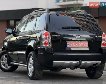 Чорний Хендай Туксон, об'ємом двигуна 2 л та пробігом 156 тис. км за 7850 $, фото 1 на Automoto.ua