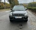 Чорний Хендай Туксон, об'ємом двигуна 2 л та пробігом 168 тис. км за 8200 $, фото 3 на Automoto.ua