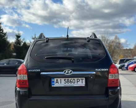 Черный Хендай Туксон, объемом двигателя 2 л и пробегом 300 тыс. км за 8300 $, фото 10 на Automoto.ua