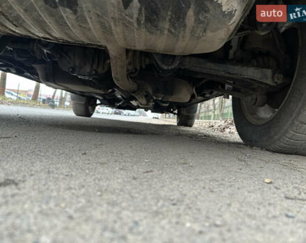 Черный Хендай Туксон, объемом двигателя 2 л и пробегом 136 тыс. км за 8500 $, фото 40 на Automoto.ua