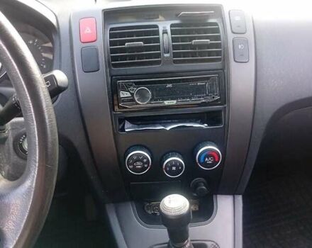 Черный Хендай Туксон, объемом двигателя 1.98 л и пробегом 195 тыс. км за 6981 $, фото 13 на Automoto.ua