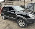 Чорний Хендай Туксон, об'ємом двигуна 2 л та пробігом 156 тис. км за 9200 $, фото 4 на Automoto.ua