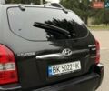 Черный Хендай Туксон, объемом двигателя 1.99 л и пробегом 240 тыс. км за 7200 $, фото 26 на Automoto.ua