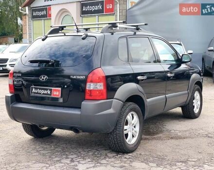 Черный Хендай Туксон, объемом двигателя 2 л и пробегом 117 тыс. км за 7990 $, фото 4 на Automoto.ua