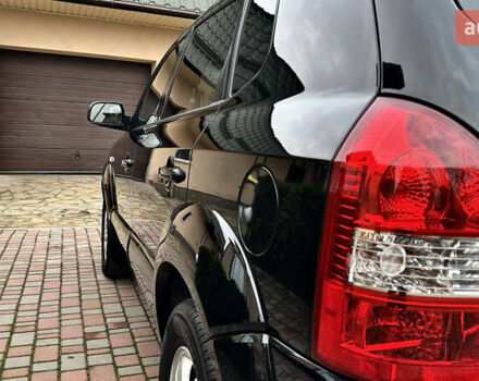 Чорний Хендай Туксон, об'ємом двигуна 2 л та пробігом 182 тис. км за 8299 $, фото 10 на Automoto.ua