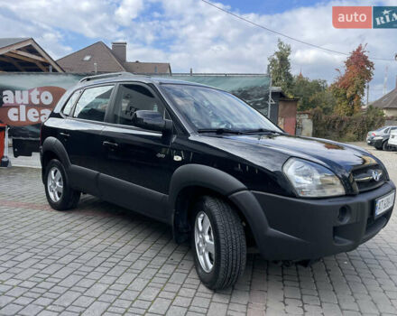 Черный Хендай Туксон, объемом двигателя 1.98 л и пробегом 177 тыс. км за 7600 $, фото 4 на Automoto.ua