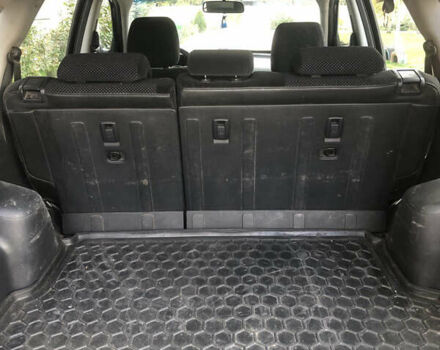 Черный Хендай Туксон, объемом двигателя 1.98 л и пробегом 256 тыс. км за 8200 $, фото 11 на Automoto.ua