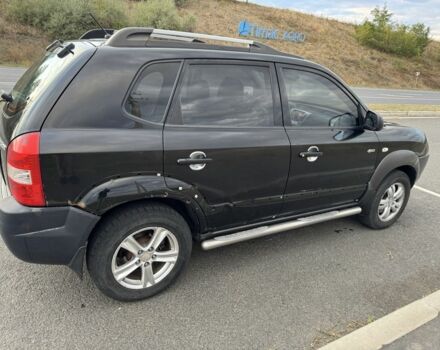 Чорний Хендай Туксон, об'ємом двигуна 2 л та пробігом 291 тис. км за 5400 $, фото 4 на Automoto.ua