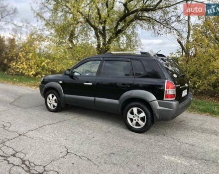 Чорний Хендай Туксон, об'ємом двигуна 1.98 л та пробігом 220 тис. км за 8000 $, фото 4 на Automoto.ua