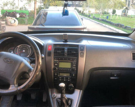 Черный Хендай Туксон, объемом двигателя 1.98 л и пробегом 256 тыс. км за 8200 $, фото 8 на Automoto.ua