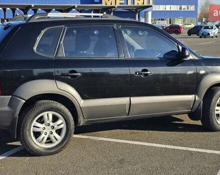 Чорний Хендай Туксон, об'ємом двигуна 1.98 л та пробігом 212 тис. км за 7766 $, фото 6 на Automoto.ua