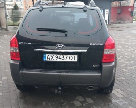 Черный Хендай Туксон, объемом двигателя 2 л и пробегом 200 тыс. км за 8300 $, фото 4 на Automoto.ua