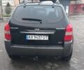 Черный Хендай Туксон, объемом двигателя 2 л и пробегом 200 тыс. км за 8300 $, фото 4 на Automoto.ua