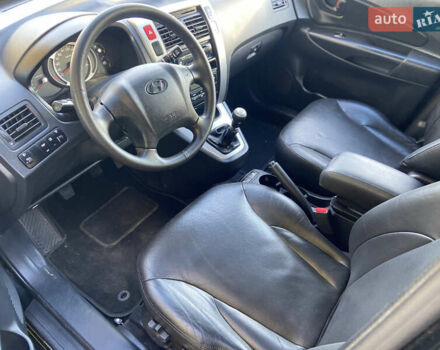 Хендай Туксон 2008 у Рівному на Automoto.ua Чорний Хендай Туксон, об'ємом двигуна 2 л та пробігом 165 тис. км за 7800 $, фото 6 на Automoto.ua