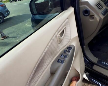 Черный Хендай Туксон, объемом двигателя 2 л и пробегом 240 тыс. км за 7500 $, фото 12 на Automoto.ua