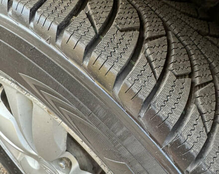 Черный Хендай Туксон, объемом двигателя 1.98 л и пробегом 196 тыс. км за 7999 $, фото 23 на Automoto.ua