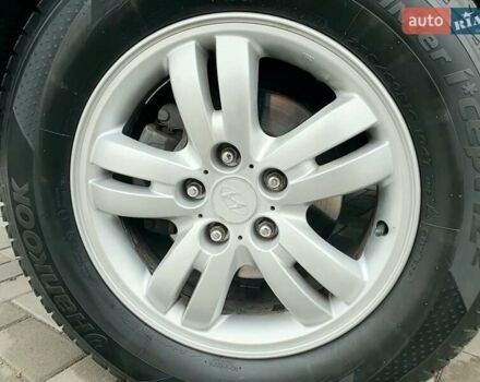 Чорний Хендай Туксон, об'ємом двигуна 2 л та пробігом 225 тис. км за 8000 $, фото 21 на Automoto.ua