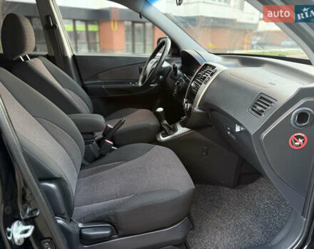 Чорний Хендай Туксон, об'ємом двигуна 2 л та пробігом 156 тис. км за 7850 $, фото 34 на Automoto.ua