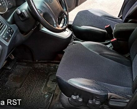 Чорний Хендай Туксон, об'ємом двигуна 2 л та пробігом 188 тис. км за 8800 $, фото 8 на Automoto.ua