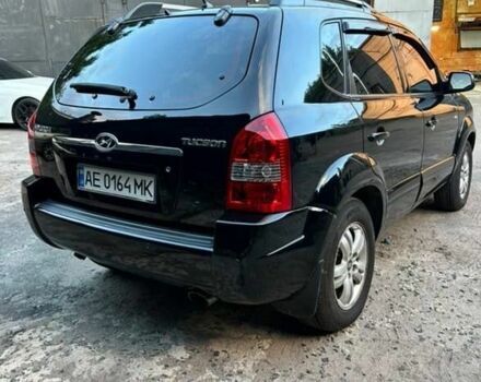 Черный Хендай Туксон, объемом двигателя 2 л и пробегом 245 тыс. км за 6500 $, фото 4 на Automoto.ua