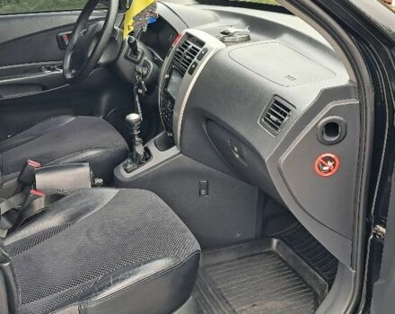 Черный Хендай Туксон, объемом двигателя 2 л и пробегом 270 тыс. км за 8300 $, фото 6 на Automoto.ua