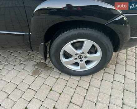 Черный Хендай Туксон, объемом двигателя 2 л и пробегом 276 тыс. км за 7450 $, фото 20 на Automoto.ua