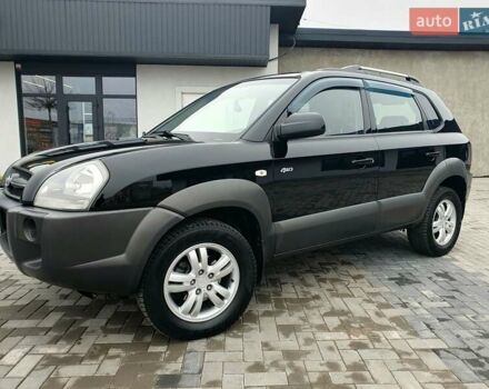 Чорний Хендай Туксон, об'ємом двигуна 2 л та пробігом 225 тис. км за 8000 $, фото 10 на Automoto.ua