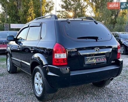 Черный Хендай Туксон, объемом двигателя 2 л и пробегом 230 тыс. км за 7500 $, фото 6 на Automoto.ua