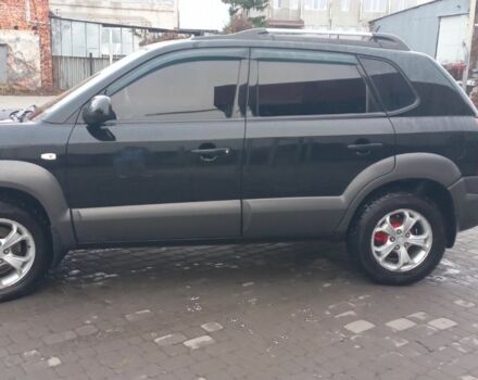 Черный Хендай Туксон, объемом двигателя 2 л и пробегом 200 тыс. км за 8300 $, фото 1 на Automoto.ua