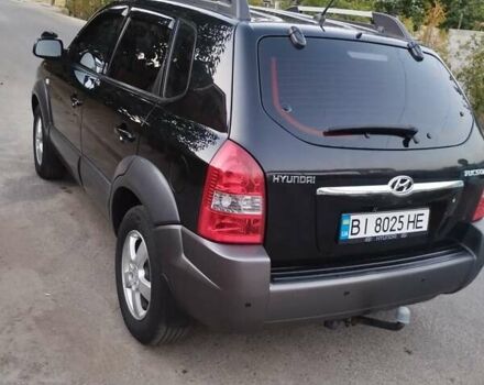 Черный Хендай Туксон, объемом двигателя 2 л и пробегом 221 тыс. км за 8600 $, фото 4 на Automoto.ua